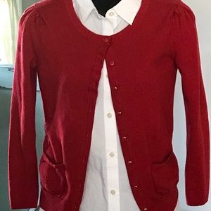 Red sweater ( blouse not included)